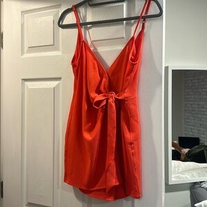 Show Me Your Mumu
Red/orange romper